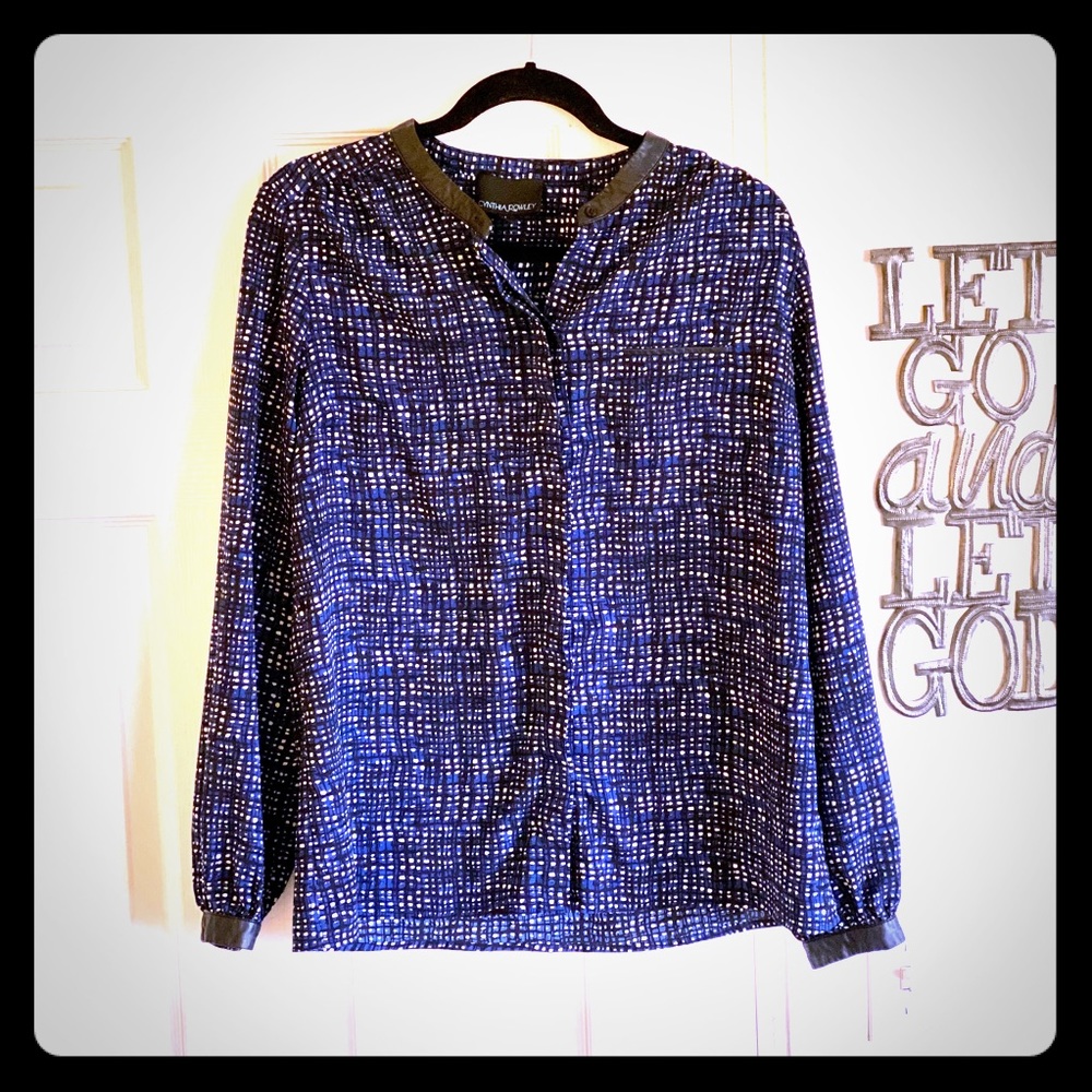 Blouse with faux leather trim